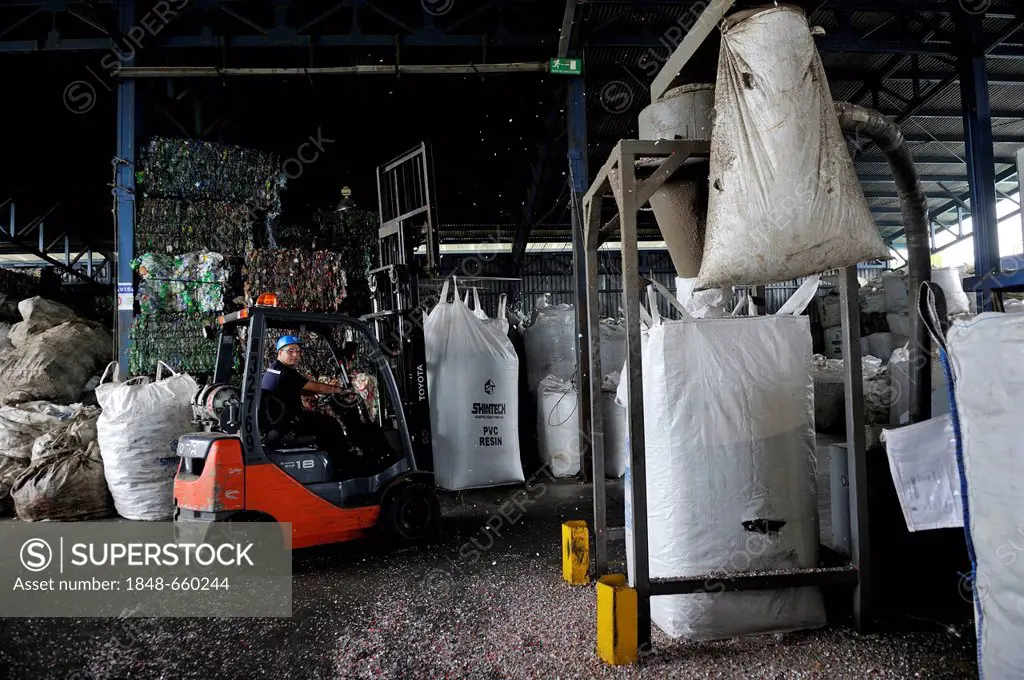 Recycling plant, old plastics are shredded and packaged into large sacks for the export to China, San José, Costa Rica, Latin America, Central America