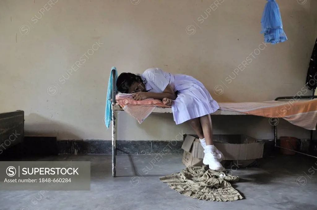 Sick girl, bedroom of the girls, school for the blind, Tangalle, Sri Lanka, Ceylon, South Asia, Asia