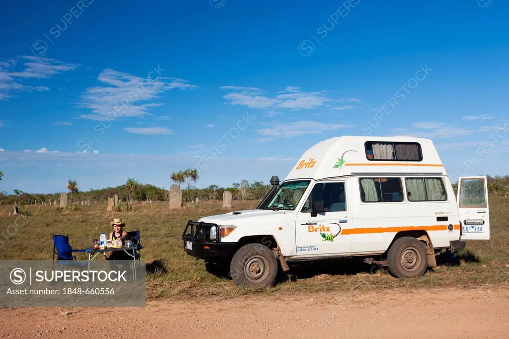 Breakfast in the Outback with a four-wheel vehicle, in front of compass or magnetic mounds built by Magnetic Termites (Amitermes meridionalis), Litchf...