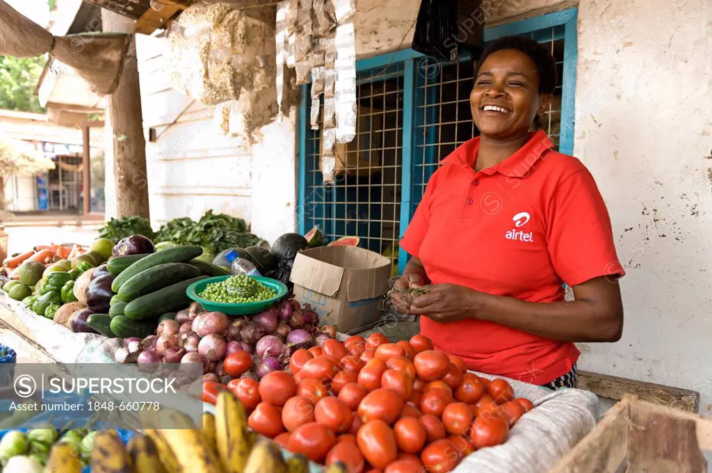 Woman selling fresh vegetables in Moshi, Kilimanjaro region, Tanzania, Africa