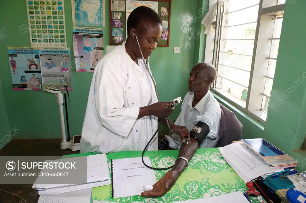 Doctor and patient in a hospital near Bukoba, Tanzania, Africa