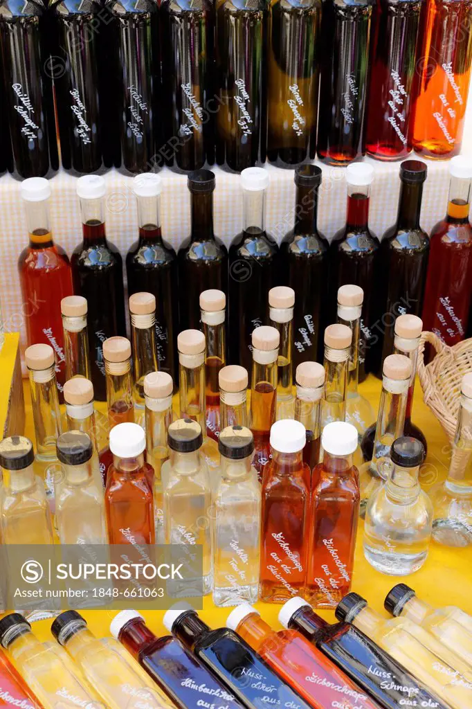 Liqueur bottles, farmers' market at Kaiser-Josef-Platz square, Graz, Styria, Austria, Europe