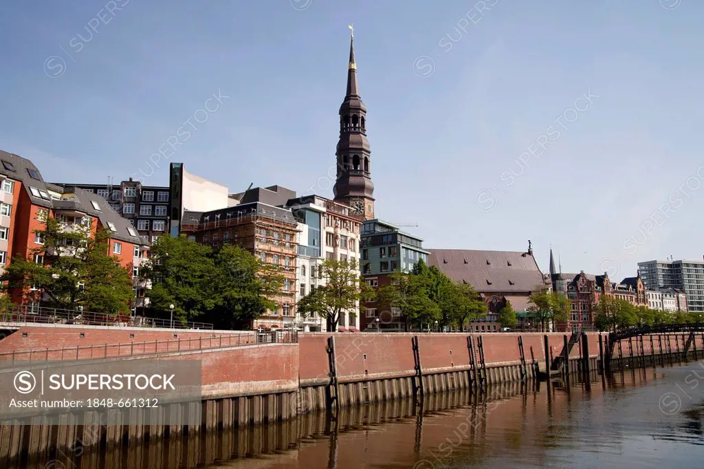 Bank of a channel and St. Catherine's Church, Free and Hanseatic City of Hamburg, Germany, Europe