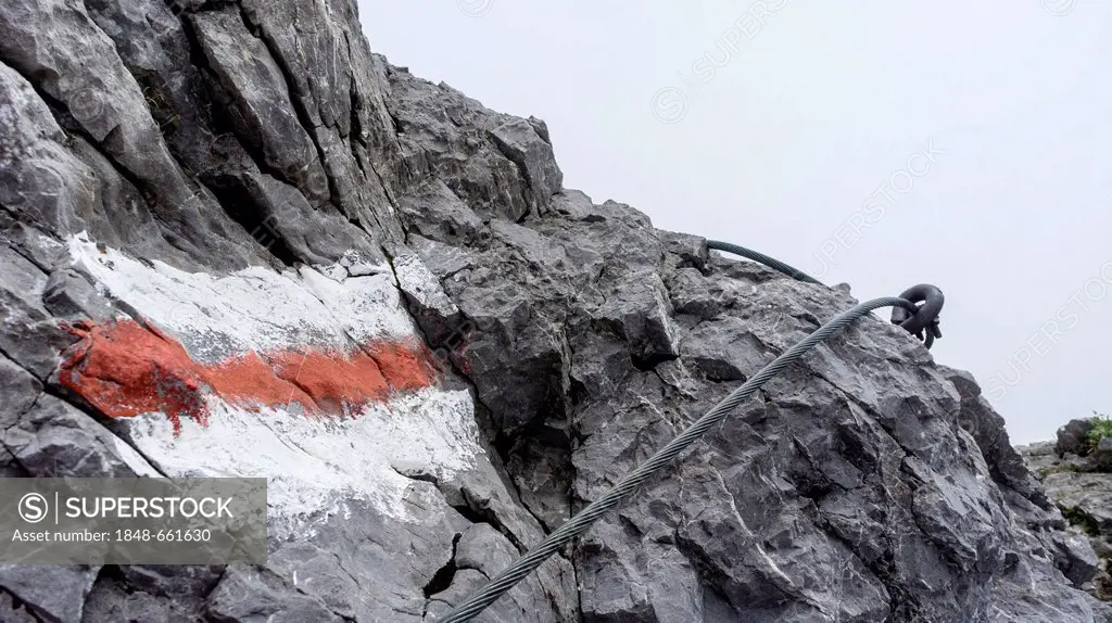 Mountain trail at Ageteplatte with steel rope, Alpstein range, Canton of St Gallen, Switzerland, Europe