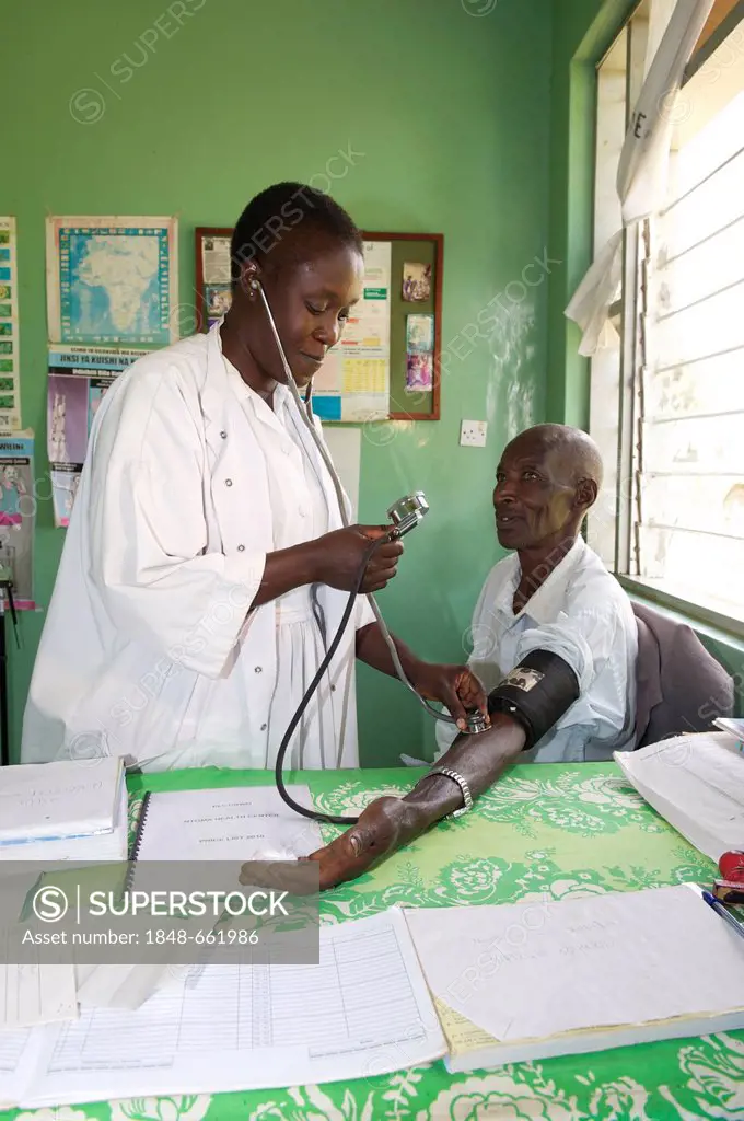 Doctor and patient in a hospital near Bukoba, Tanzania, Africa