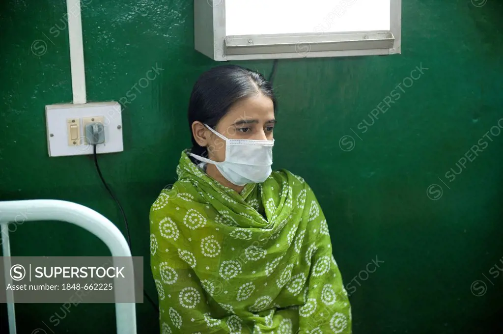 TB or tuberculosis patient with a surgical mask, St. Thomas Home Hospital, Shibpur district, Haora or Howrah, Calcutta, Kolkata, West Bengal, India, A...