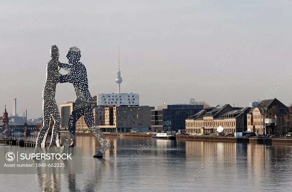 Molecule Man, monumental metal sculpture in the Spree river, former Osthafen harbour, Friedrichshain district, Berlin, Germany, Europe