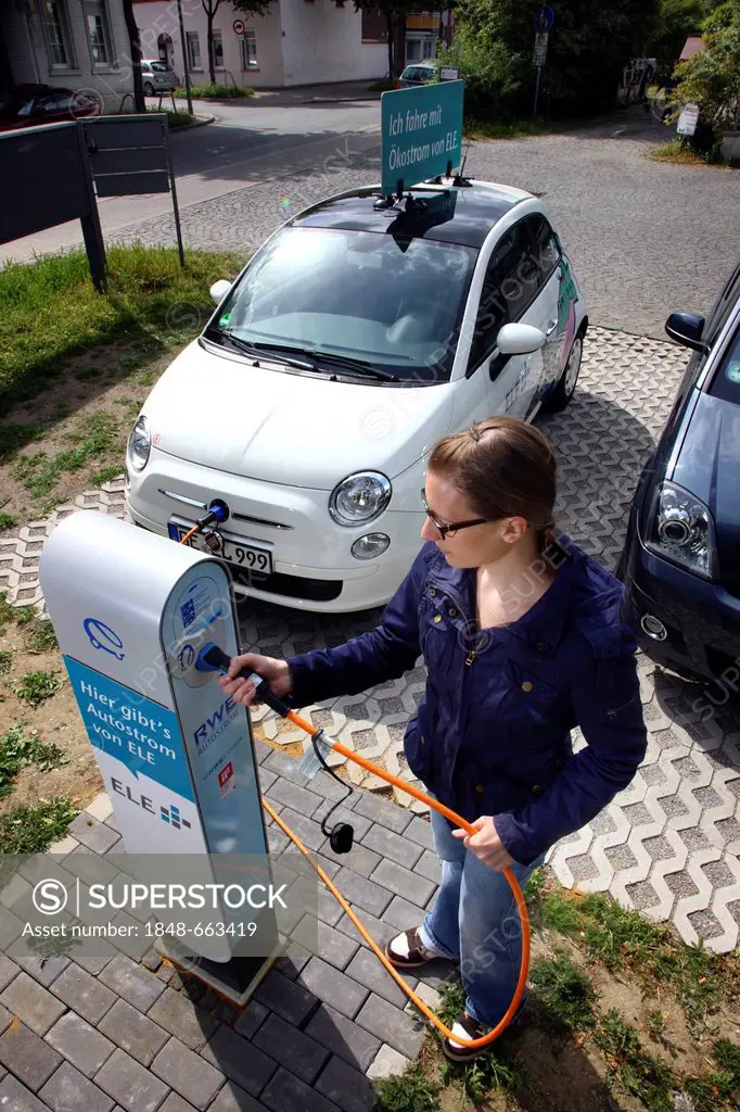 Electric car of the Emscher Lippe Energie GmbH, ELE, type Fiat 500, at a charging station, Gelsenkirchen, North Rhine-Westphalia, Germany, Europe