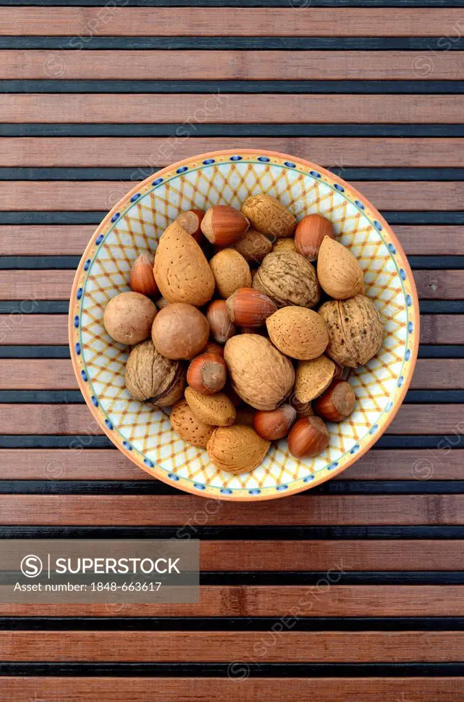 Various nuts, walnuts, almonds, hazelnuts in a bowl