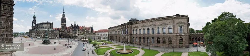 Panorama of the Theaterplatz theatre square from the Semperoper opera, Katholische Hofkirche church, left, the Dresden Castle, center, and the Zwinger...