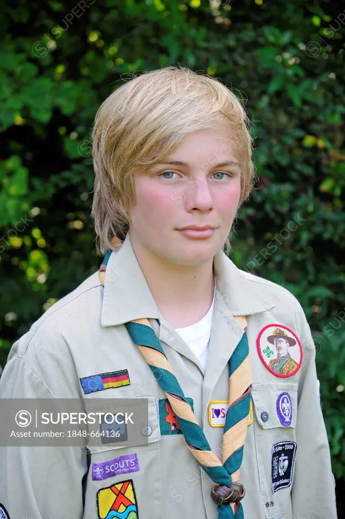 Boy, 13, wearing a Scouts uniform with badges, neckerchief, Gelsenkirchen, North Rhine-Westphalia, Germany, Europe