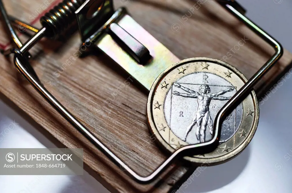 Italian one-euro coin into the debt trap, symbolic image