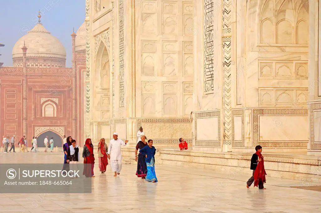 People visiting the Taj Mahal, mausoleum, built by Mughal emperor Shah Jahan in memory of his third wife, Mumtaz Mahal, who died in 1631, UNESCO World...