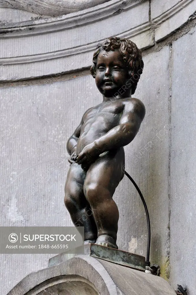Manneken Pis or le Petit Julien, fountain figure of a boy urinating, sculptor Jerome Duquesnoy, 1619, a landmark of Brussels, Brussels, Belgium, Europ...