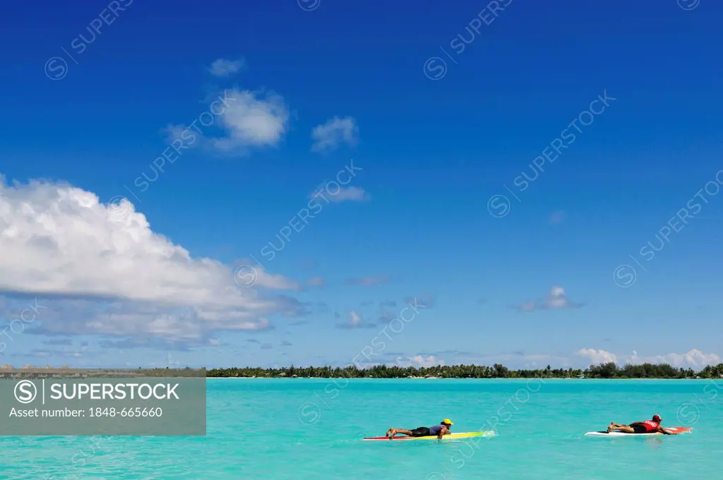 Tourists relaxing on the water, St. Regis Bora Bora Resort, Bora Bora, Leeward Islands, Society Islands, French Polynesia, Pacific Ocean