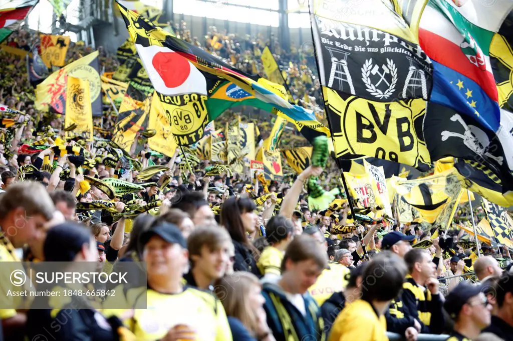 Fans of BVB Borussia Dortmund 09 football club on the south stand, Signal Iduna Park football arena, Dortmund, North Rhine-Westphalia, Germany, Europe