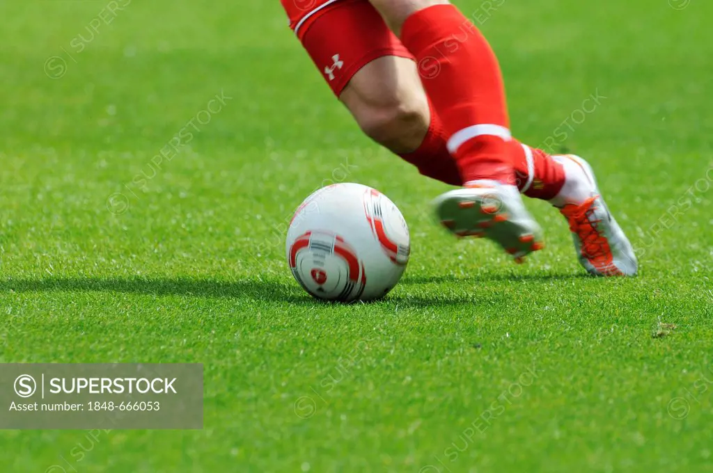 Legs of a Fortuna Duesseldorf player playing the ball, during match versus Alemannia Aachen, 2nd Bundesliga, Airberlin World, Duesseldorf, North Rhine...