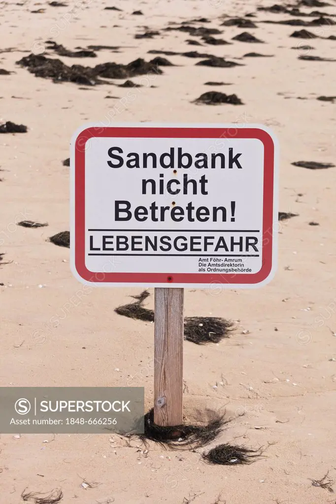 Sandbank nicht betreten! Lebensgefahr, sign in German warning of a dangerous sandbank which should not be entered, on the island of Amrum, North Frisi...