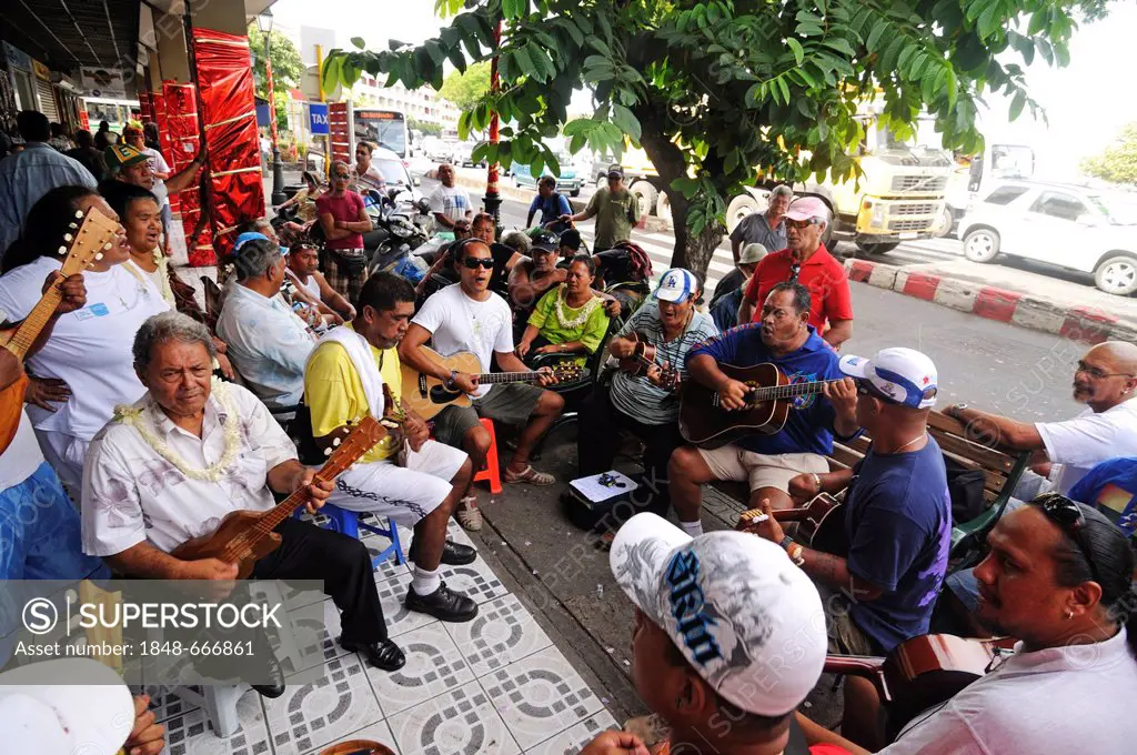 Tahitians playing music, Papeete, Tahiti, Society Islands, French Polynesia, Pacific Ocean