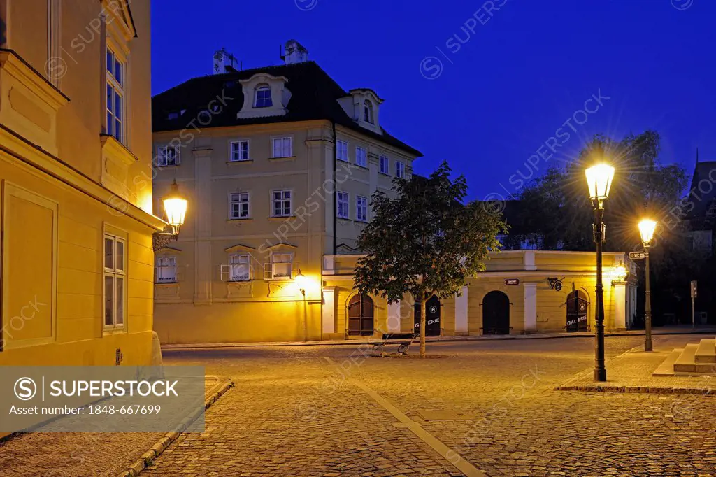 Typical street with historic streetlamps at night, Mala Strana, Prague, Czech Republic, Europe