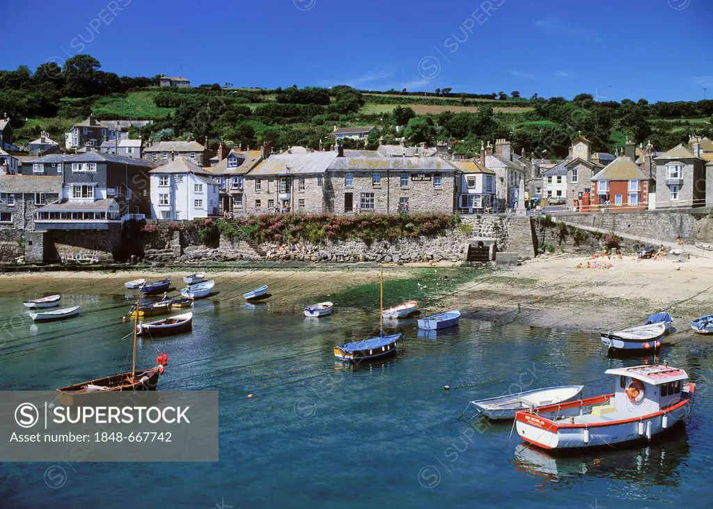 Fishing boats in the harbor of Mousewhole, Cornwall, England, United Kingdom, Europe