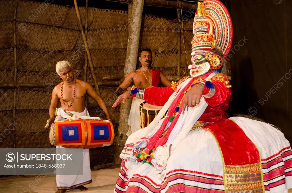 The Kathakali character Ravana on stage at Kolornagerkavu-Mandir in Perratil, Kerala, India, Asia