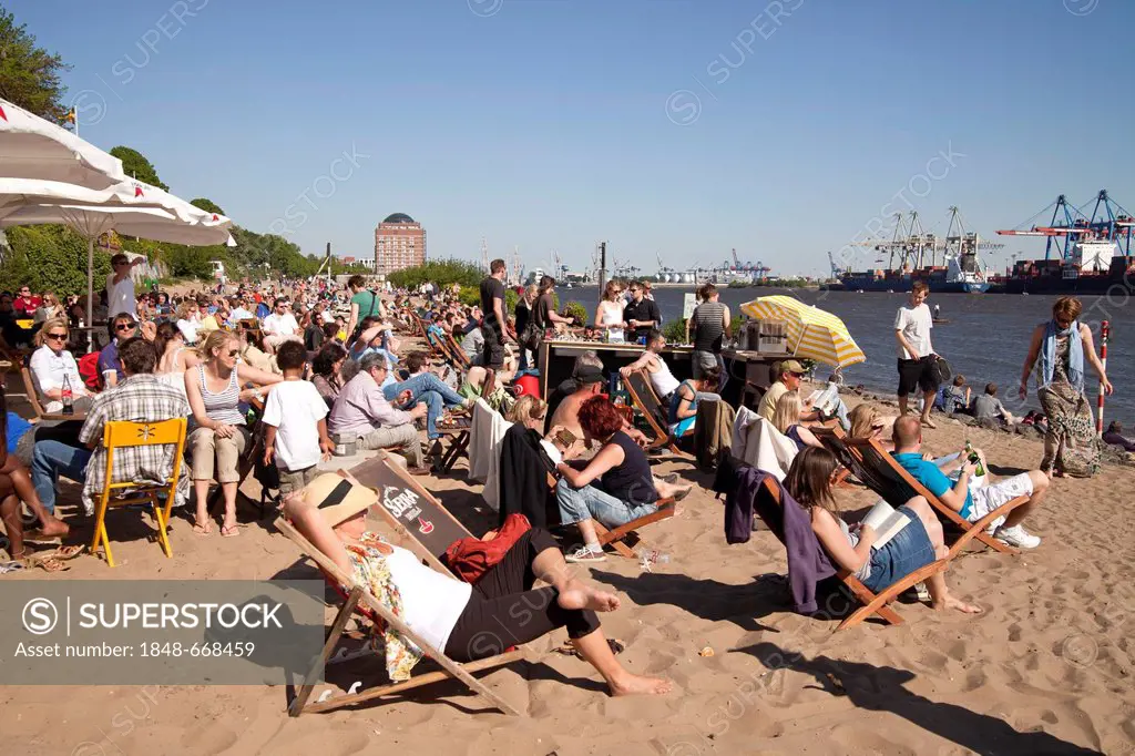 Crowded beach bar at the river Elbe shore in Oevelgoenne, Hanseatic City of Hamburg, Germany, Europe