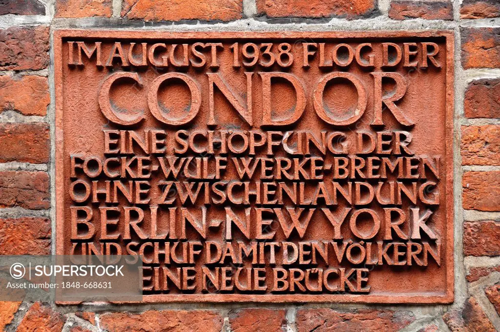 Commemorative plaque to the flight of the Condor, Berlin - New York, 1938, set into a wall in Boettcherstrasse, Bremen, Germany, Europe
