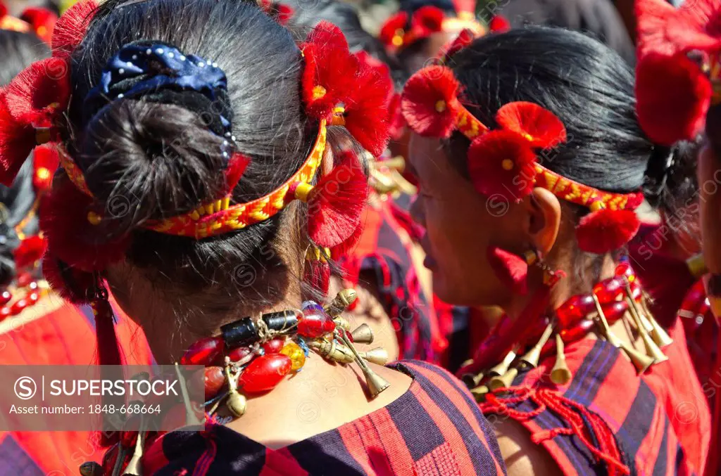 Women of the Samdom tribe with traditional headdress at the annual Hornbill Festival, Kohima, Nagaland, India, Asia