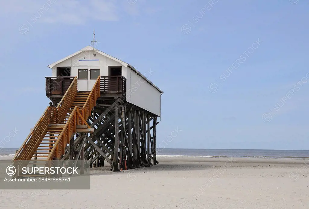 Building built on stilts, beach on the North Sea, St. Peter-Ording, Schleswig-Holstein, Germany, Europe