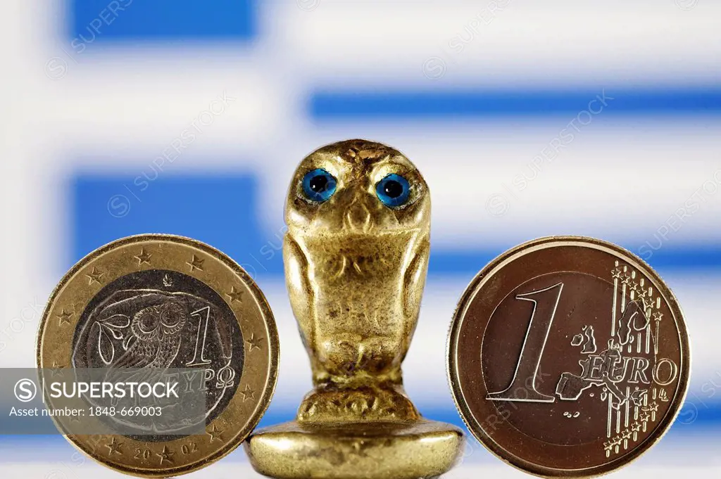 Greek euro, owl and Greek flag, symbolic image for the imminent national bankruptcy of Greece