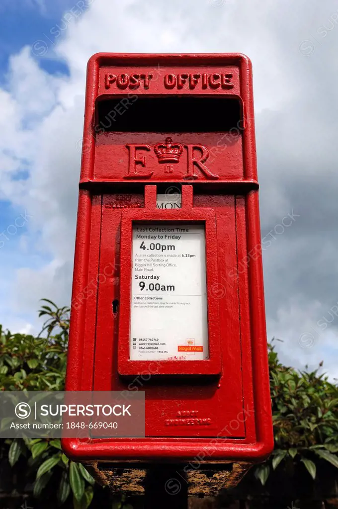 Red British postbox with the initials E and R, Elizabeth Regina, Queen Elizabeth II, Kent, England, United Kingdom, Europe