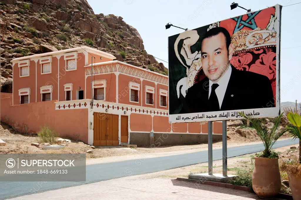 Advertising panel with a poster of the Moroccan King Mohammed VI. in Tafraout, Tafrawt, Anti-Atlas mountain range, Morocco, North Africa, Africa