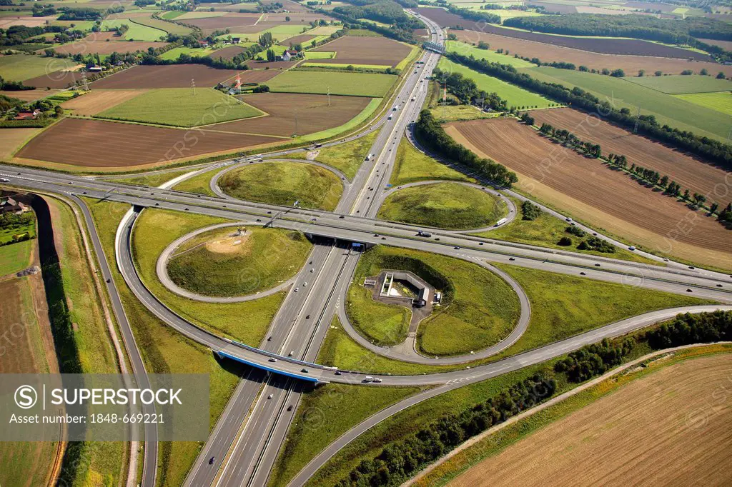 Aerial view, ADAC monument to honour the Yellow Angels, artist Alex Gockel, at the Kamener Kreuz, cross junction of the A1 and A2 motorways, Kamen, Ru...