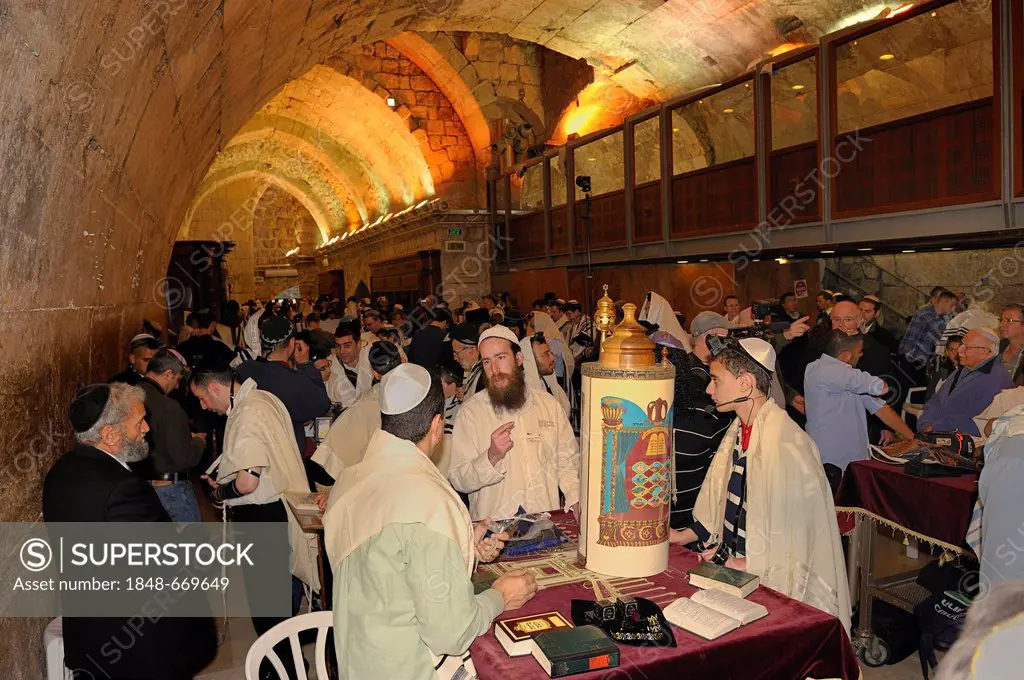Torah scroll standing on the table for the bar mitzvah, beginning of Jewish adulthood for boys, Wailing Wall, old town of Jerusalem, Israel, Middle Ea...