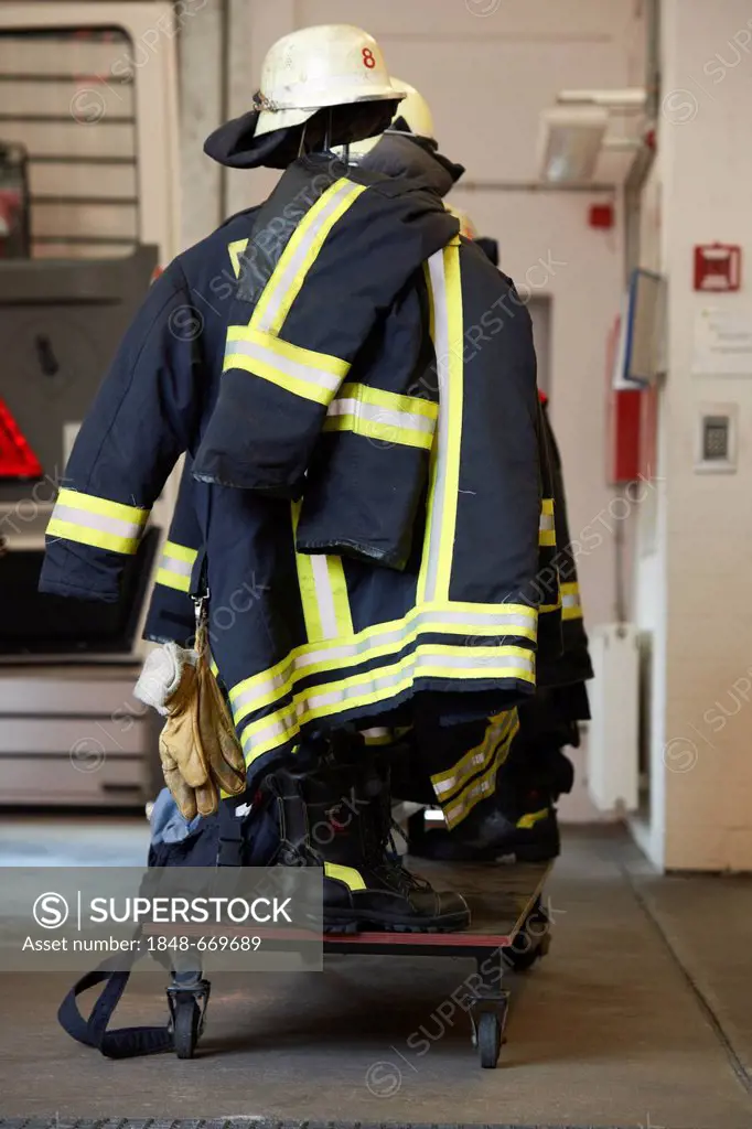 Protective firefighters clothing with helmet, ready for putting on
