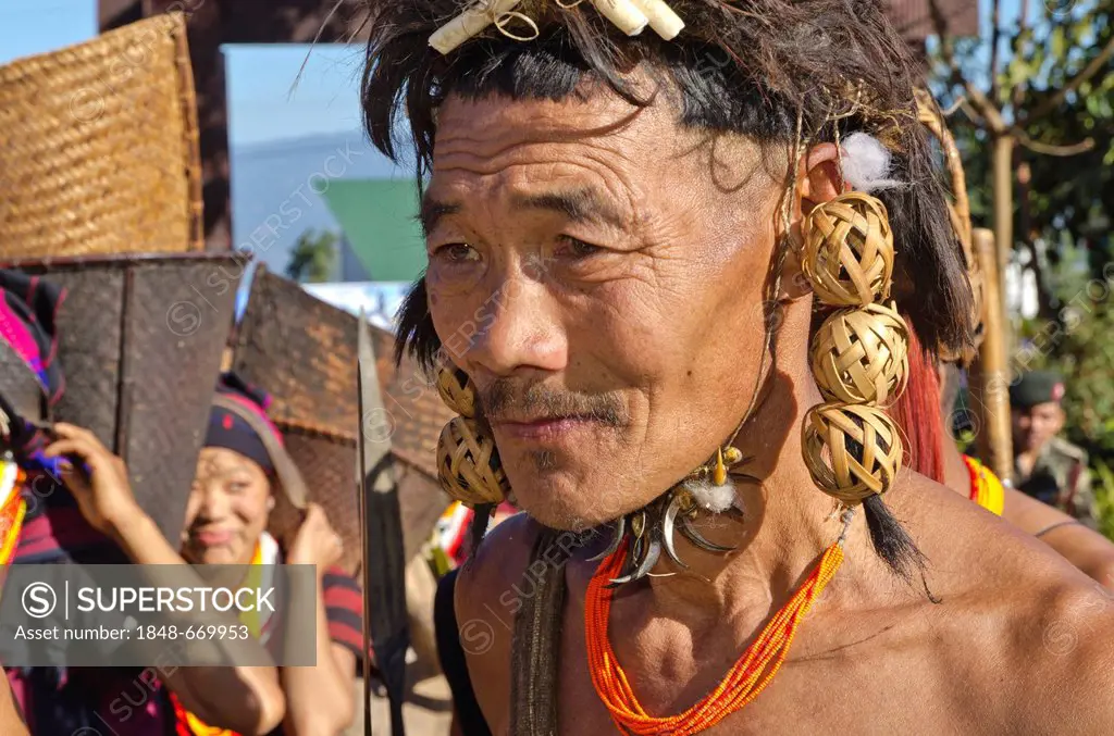 Man in tribal dress at the annual Hornbill Festival in Kohima, India, Asia
