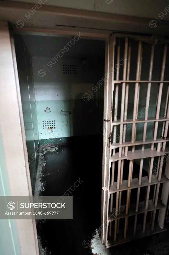 Dark prison cell, The Hole, in cell block D in prison, Alcatraz Island, California, USA