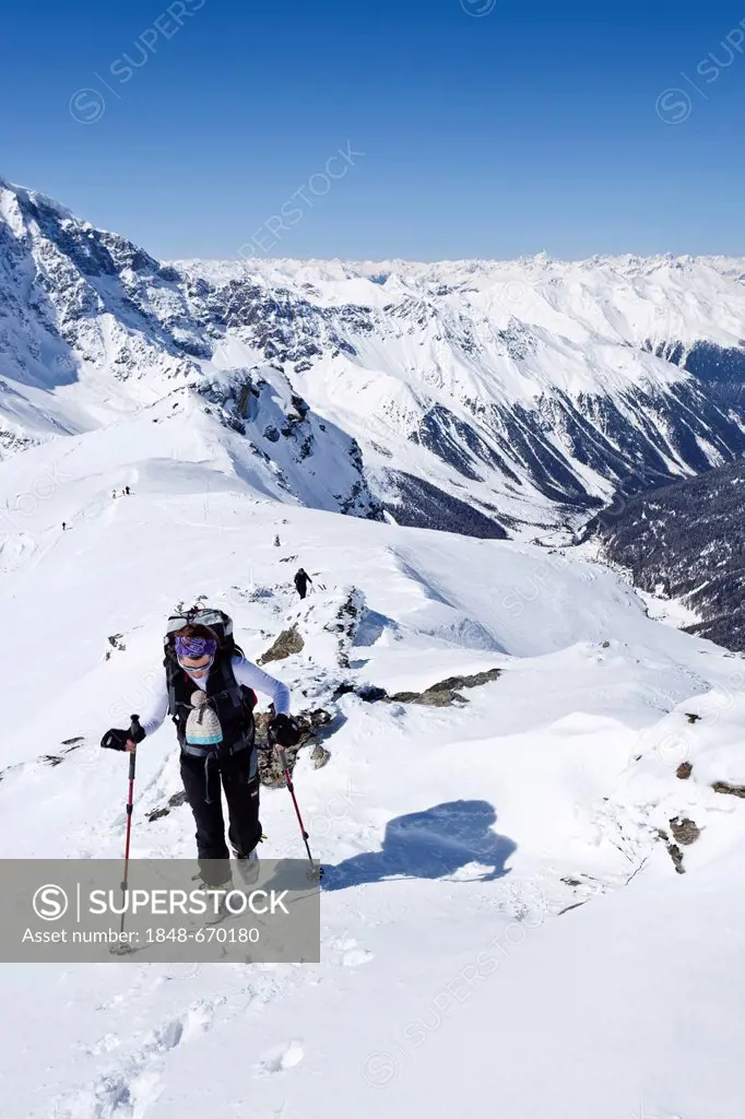 Ski touring, ascending to Mt. Hintere Schoentaufspitze, Solda in winter, behind Suldental valley, South Tyrol, Italy, Europe