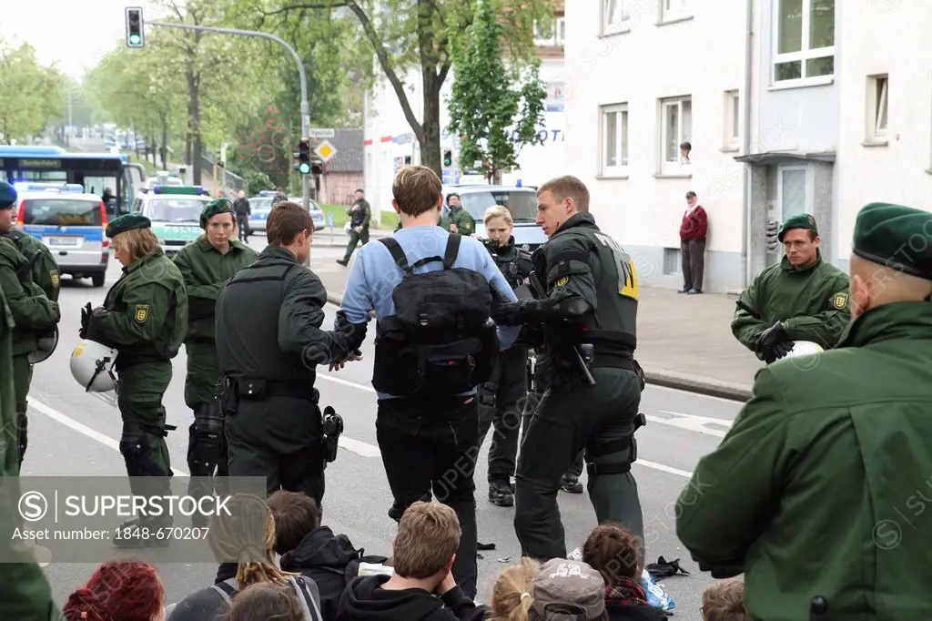 1st May rally, police arresting a leftist protester who was disturbing the right to demonstrate, Heilbronn, Baden-Wuerttemberg, Germany, Europe