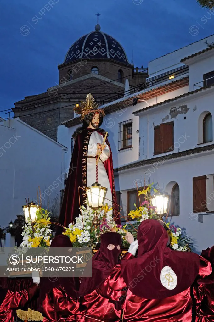 Christ figure, masked carriers in red hoods, Easter procession, Altea, Alicante, Spain, Europe