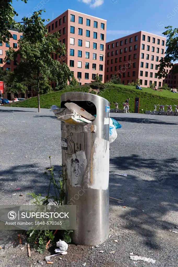 Full trash can on the roadside, Mitte district, Berlin, Germany, Europe