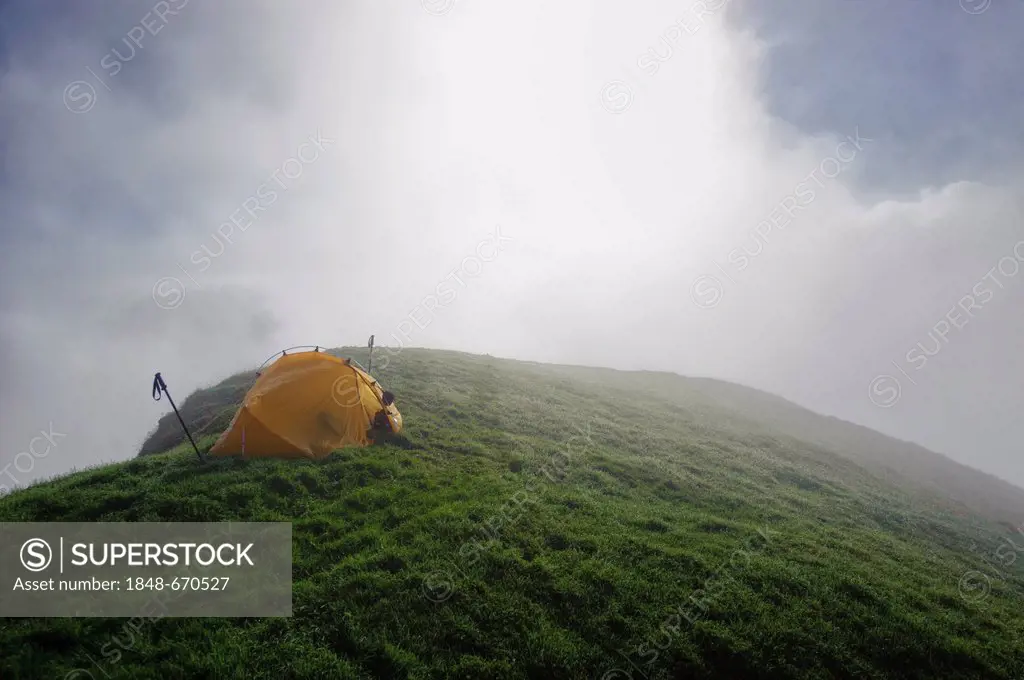 Tent on a mountain ridge with fog, Ammergebirge, Ammer Mountains, Garmisch, Bavaria, Germany, Europe