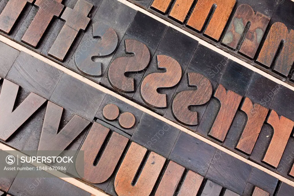 Old wooden letters for printing, type case with bold poster font