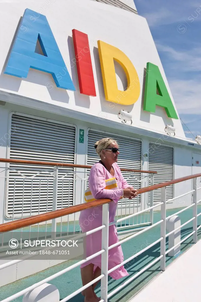 Woman standing at the railing of the Aida Club Cruiser, Corsica, France, Europe - Attention: Restricted right of use! Please ALWAYS contact the press ...