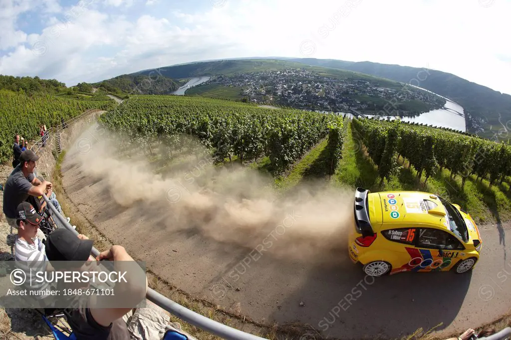 Henning Solberg from Norway with co-driver Ilka Minor from Austria competing in the ADAC-Rallye Deutschland, Germany rally, in the vineyards near Pies...