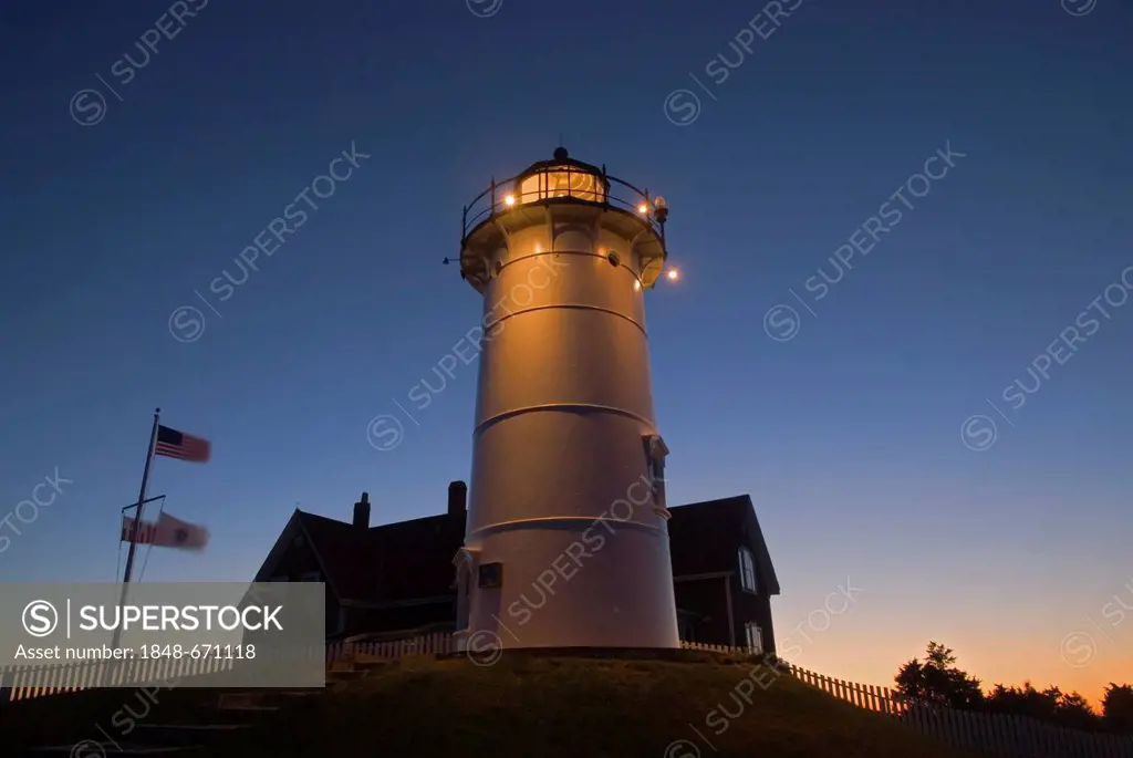 Sunrise behind Nobska Lighthouse near Woods Hole on Cape Cod, Massachusetts, USA