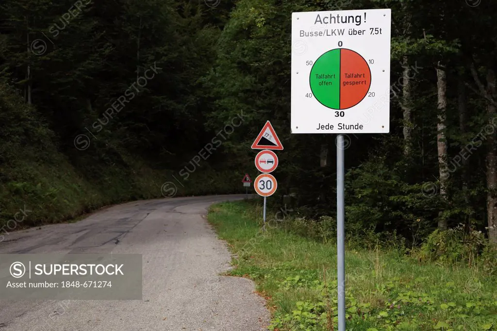 Sign showing timed descent schedule for buses and trucks on Stollenbach in the Black Forest, Baden-Wuerttemberg, Germany, Europe