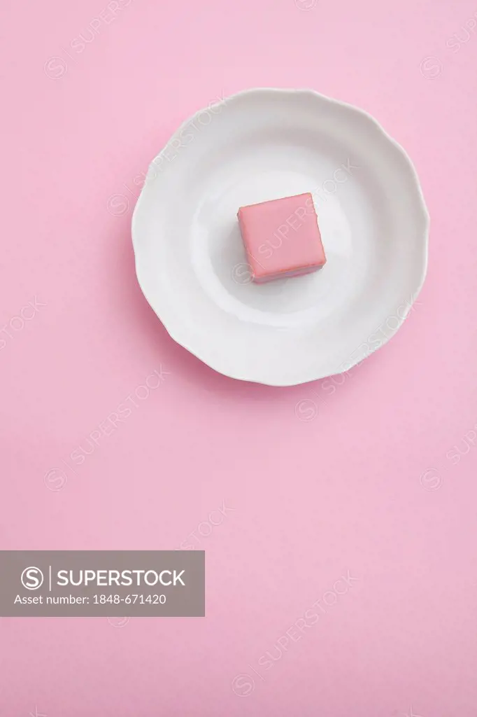 Pink chocolate on a plate, dessert