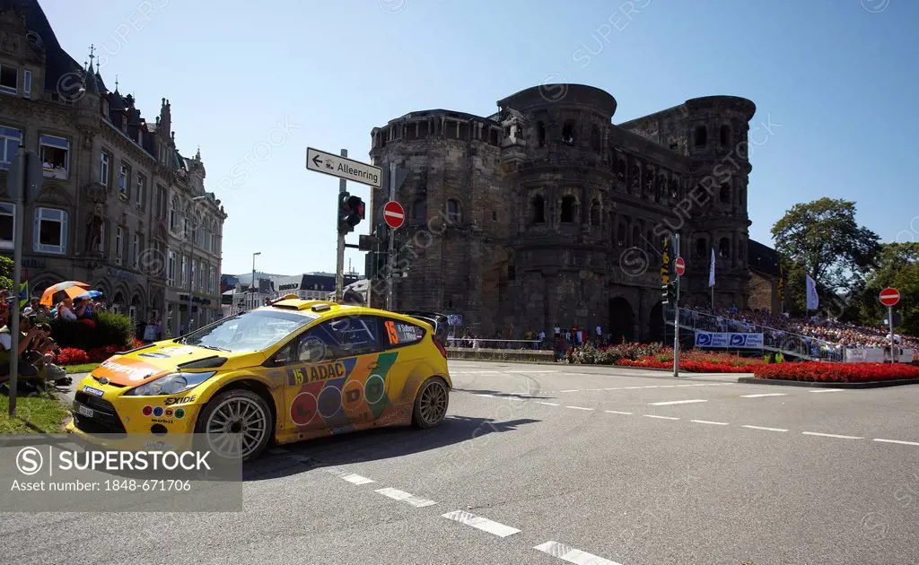 Ford of Henning Solberg from Norway and co-driver Ilka Minor from Austria, in front of the Porta Nigra on the final stages of the ADAC-Rallye Deutschl...